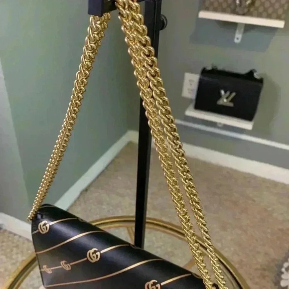 Gucci mini leather chain bag with double G stripe in black and gold. - Picture 4 of 14